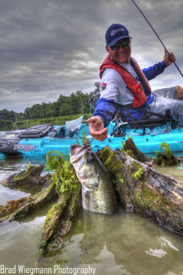 Brandon Coulter reaching for a bass